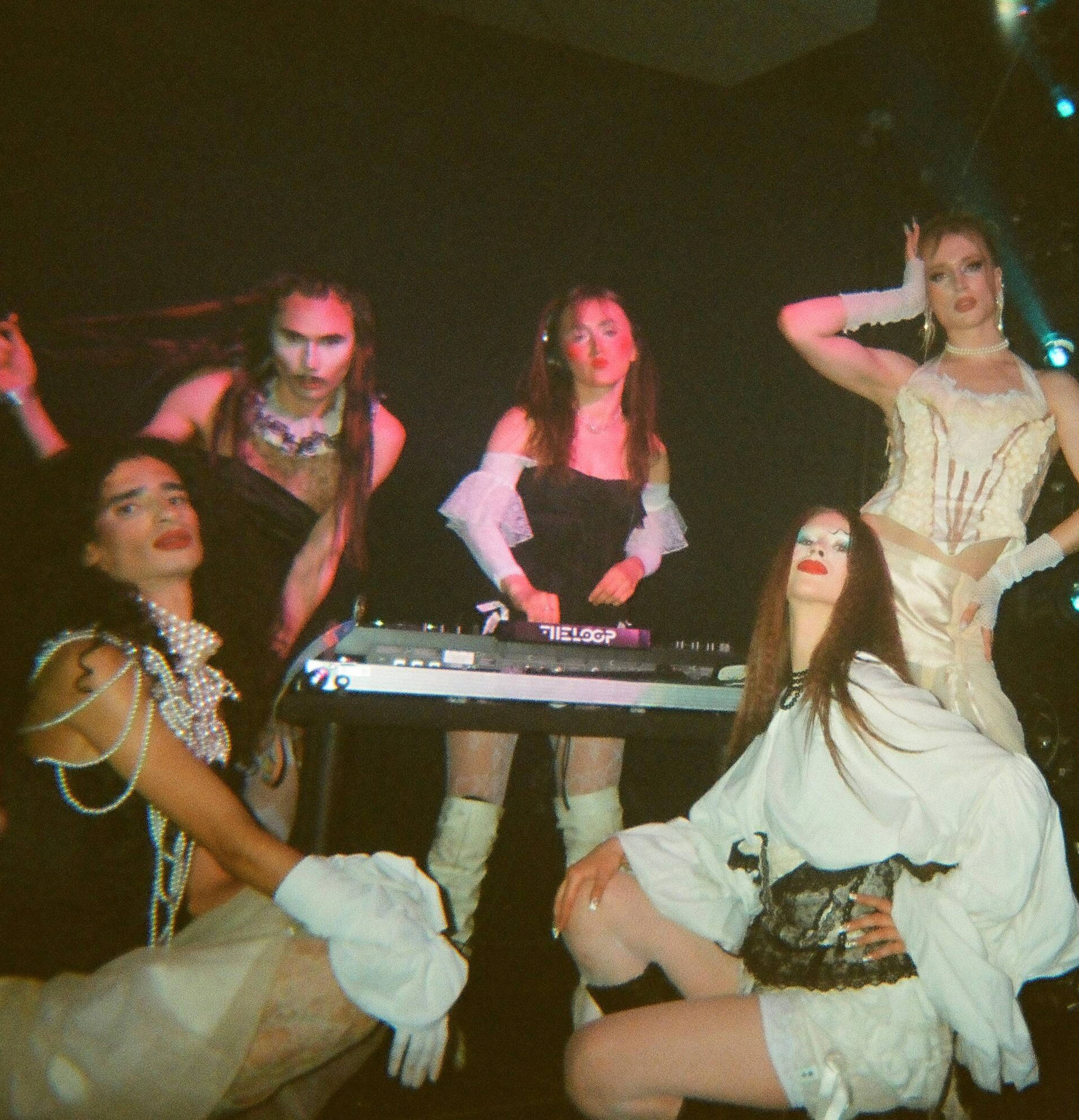 Photo of VOLA Default posing behind a DJ set