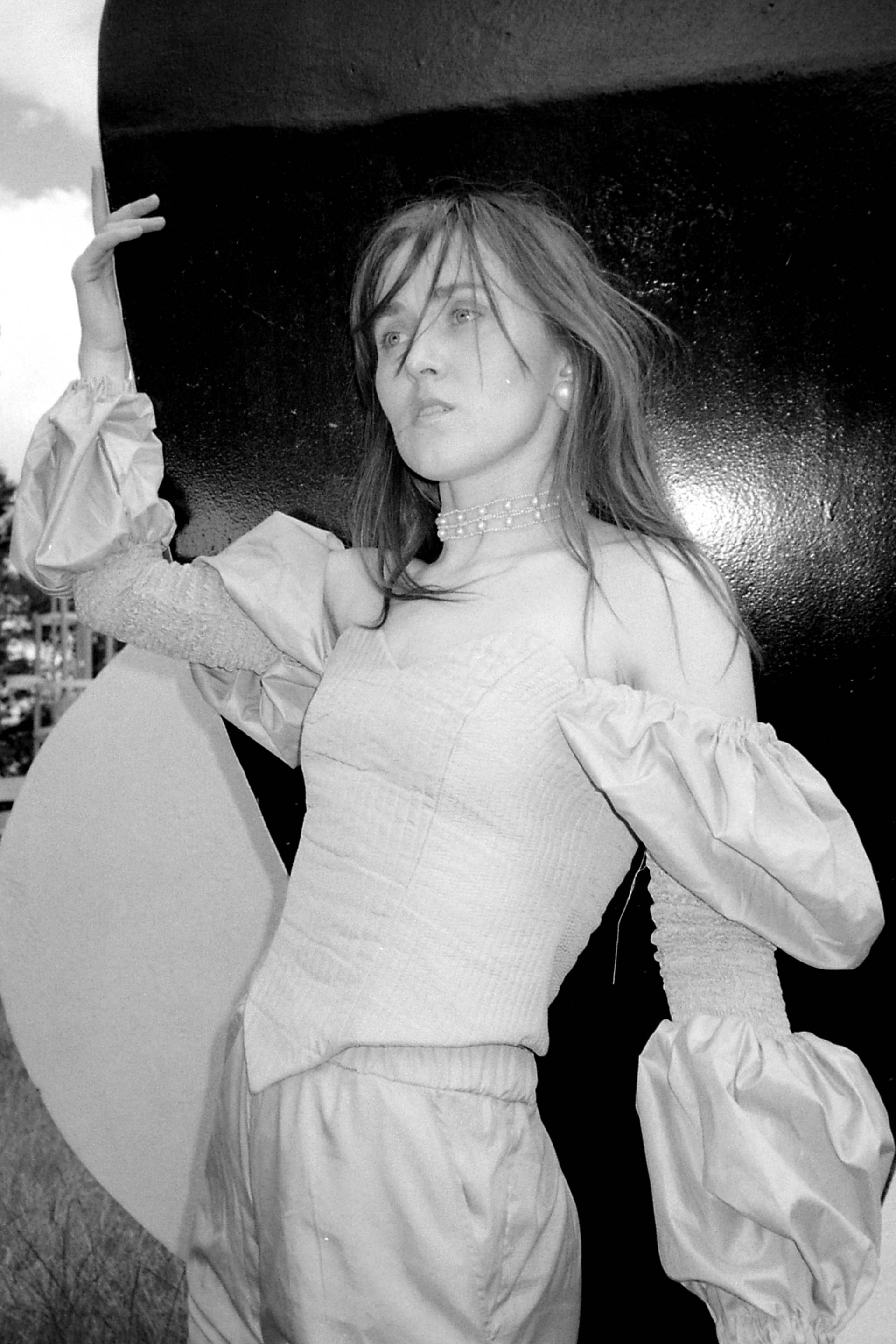 Photo of VOLA Default posing against a black background